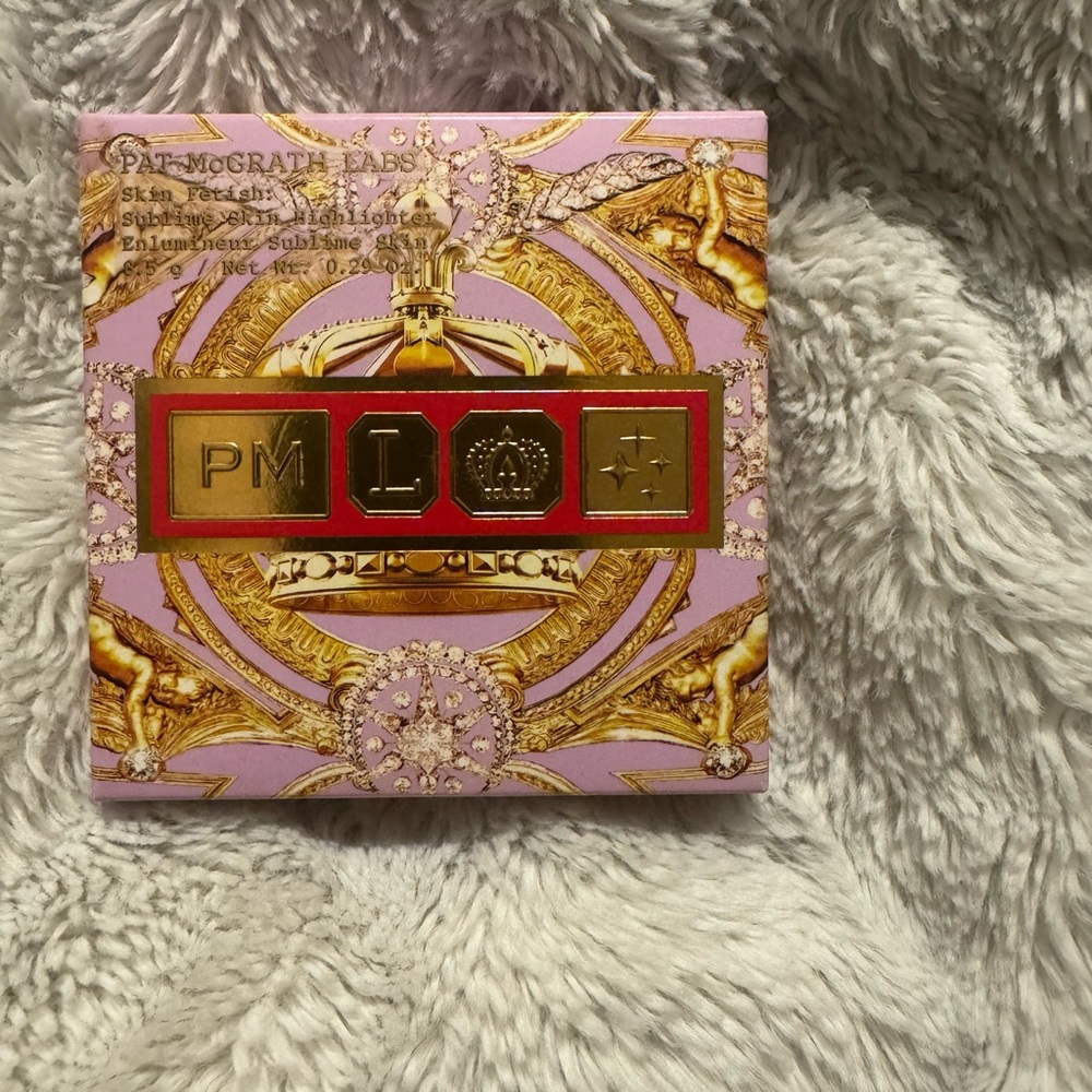 Pat McGrath Labs Highlighter in Gold and Purple Packaging